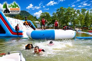 a group of people in the water at a water park at Ranong Adventure Resort & Park in Ranong