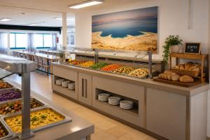 a bakery with lots of different types of food at SPNI Ein Gedi Field School in Ein Gedi
