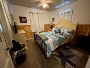 a bedroom with a bed in a room at The conch cottage in Crystal River