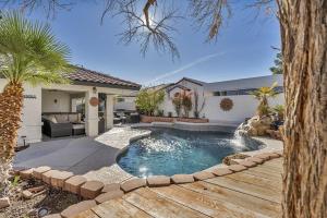a swimming pool in the backyard of a house at Ultimate Vacation: A Luxurious Oasis with a Pool! in Las Vegas
