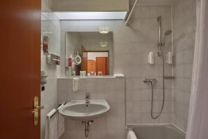 Ein Badezimmer in der Unterkunft Novum Hotel Mannheim City