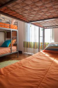 Postel nebo postele na pokoji v ubytování 18St. Hostel