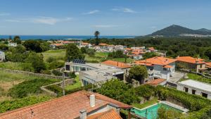 an aerial view of a town with houses at Just Like Home - Casa do Cruzeiro in Moledo