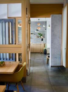 a room with a table and a dining room at Boutique-Hotel "Stilvoll" in Andernach