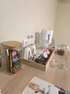 a kitchen counter with a tray of food on it at Ketty apartments in Niš