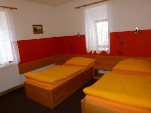 Postel nebo postele na pokoji v ubytování Hotel Pelikan