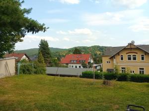 a view from the backyard of a house at Ferienwohnung Finkenberg in Sebnitz