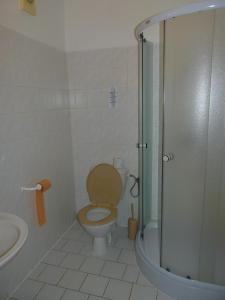 Koupelna v ubytování Hotel Pelikan