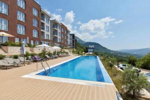 an image of a swimming pool at a hotel at Cosy Adriatic Studio in Kotor