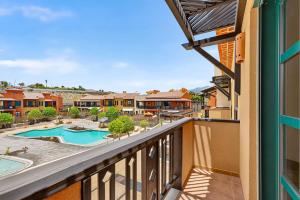 a balcony with a view of a pool and a resort at Luna in San Blas in San Miguel de Abona