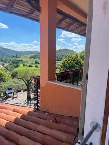a view from the balcony of a house with a view at Hotel Ristorante San Michele in Ome
