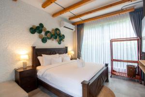 a bedroom with a large bed and a large window at Sawasdee pool villa, Hua Hin in Hua Hin +31 photos