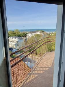 a balcony with a view of the ocean at X Hotel in Punta Marina