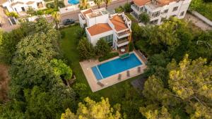 an aerial view of a house with a swimming pool at Villa Diva in Kemer