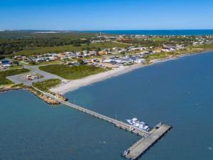 an aerial view of a dock in a body of water at dhu drop inn in Cervantes