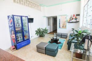 a large room with a video game machine in it at Hotel Ariari Azul in Villavicencio