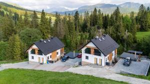 an aerial view of a house in the mountains at Chata Alexia Oravice in Vitanová