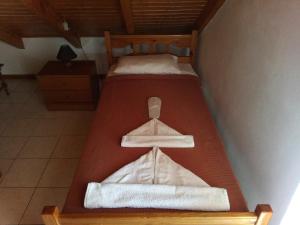 a bunk bed with two beds in a room at Nicolas Rooms in Fiskardo