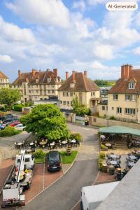 a view of a town with cars parked on a street at L'échappée Seine - Idéalement situé in Barentin