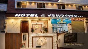 a hotel vinalhaven with a sign on the front of it at Hotel Shree Vrindavan in Nāthdwāra