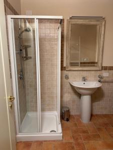 a bathroom with a shower and a sink at La Quiete di Rivalta in Rivalta Trebbia +36 photos