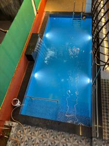 an overhead view of a swimming pool at Cinnamon Villa - The Dream Stays ll Pvt Pool ll 3Ac Rooms ll Wi-Fi in Khandāla