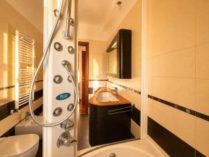 a bathroom with a shower and a sink and a toilet at Del Console Garden Suite - Near Bari Airport & Station in Modugno +20 photos