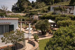 a view of the garden of a villa at Relais Caposcuro Capri in Anacapri