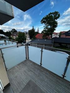a view from the roof of a building with stairs at Apartament w Dolinie Baryczy in Milicz