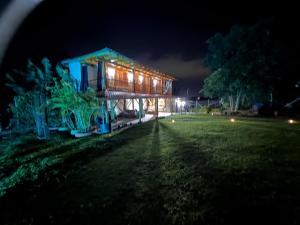 a building with lights on it at night at Villa Mara in Filandia