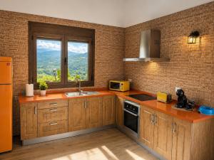 ครัวหรือมุมครัวของ La Casa de Nuria +27 ภาพ
