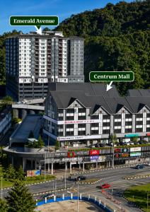 a large building with a black roof in a city at Blissful Escape Perfect Homestay for Families & Friends Brinchang Clover Home 3-03A in Brinchang