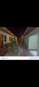 a picture of a house with a garage at Lions adventure in Narok
