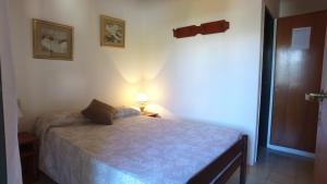 Ένα ή περισσότερα κρεβάτια σε δωμάτιο στο Hosteria Nilo Azul