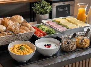 a buffet with different types of food on a table at apartmenttwelve in Trogir