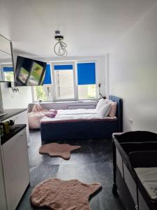 a bedroom with a large bed and a window at Moon Love in Pakopi