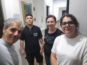a group of people standing in a room at Mare Apartment in Nocera Inferiore