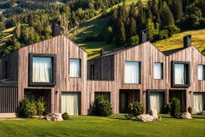 a house on top of a mountain at AMIL chalets dolomites - Guests aged 14 and over in Arnbach
