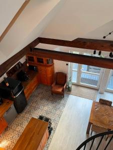 an overhead view of a living room with an attic at Apartament Morgan in Mieroszyno +25 photos