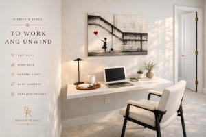 a room with a desk with a laptop and a chair at Breezery Retreat - 8 Min to Airport - Indoor Pool Sauna Wellness Billiards Sports Court in Richmond +11 photos