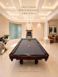 a billiard room with a pool table in it at Breezery Retreat - 8 Min to Airport - Indoor Pool Sauna Wellness Billiards Sports Court in Richmond