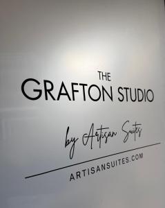 a sign that reads the station studio by african style at Artisan Suites on Bowen in Bowen Island