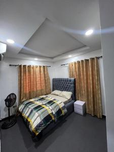 a bedroom with a bed in a room at ParamountLuxe 4 bedroom duplex in Ikeja in Ikeja
