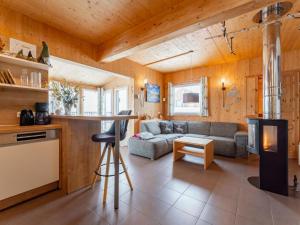a living room with a couch and a table at Heidi und Peter in Hohentauern