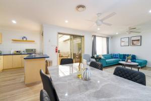 a kitchen and a living room with a table and chairs at 3BR Guesthouse w Sunroom Near Stanhope Leisure in Glenwood