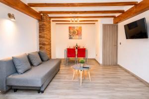 a living room with a couch and a table at apartamento las torres-botanico con 2 habitaciones in Valencia