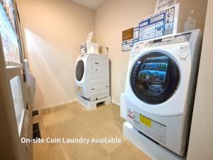 a room with a washing machine in a room at Hotel Intergate Kanazawa in Kanazawa +50 photos