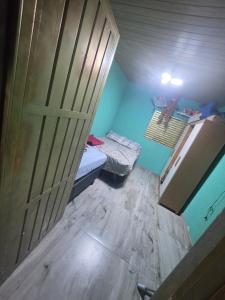 an overhead view of a room with a door at Chácara pedaçoDcéu in Cavalcante