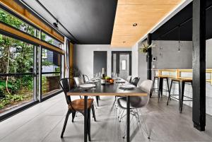 a dining room with a table and chairs at THE GRANDEUR in Sapporo +50 photos