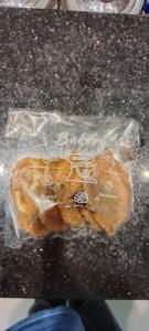 a pastry in a plastic bag on a table at The rooftop villa 3 in Tây Ninh